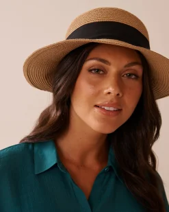 Sale Cloche Hat with Ribbon On Neutral Ground
